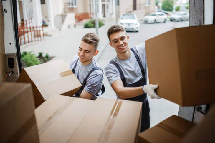 movers-with-moving-boxes Movers with moving boxes